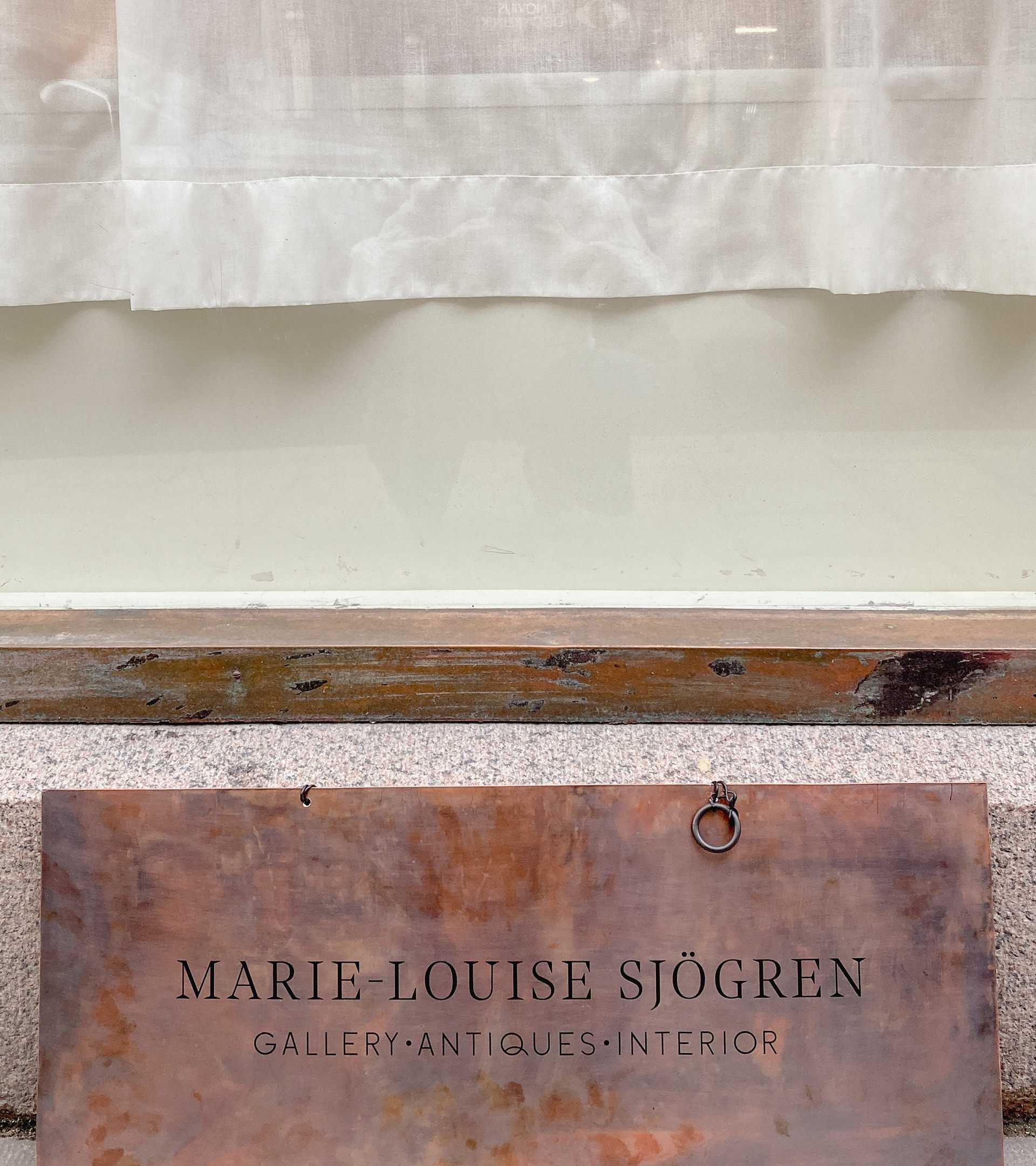 Storefront sign for Marie-Louise Sjögren designed by Studio Poi
